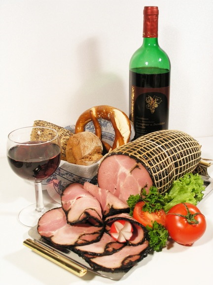 Wine and ham on a table